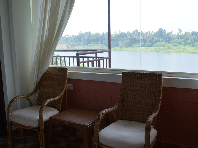 interior wicker chairs river view